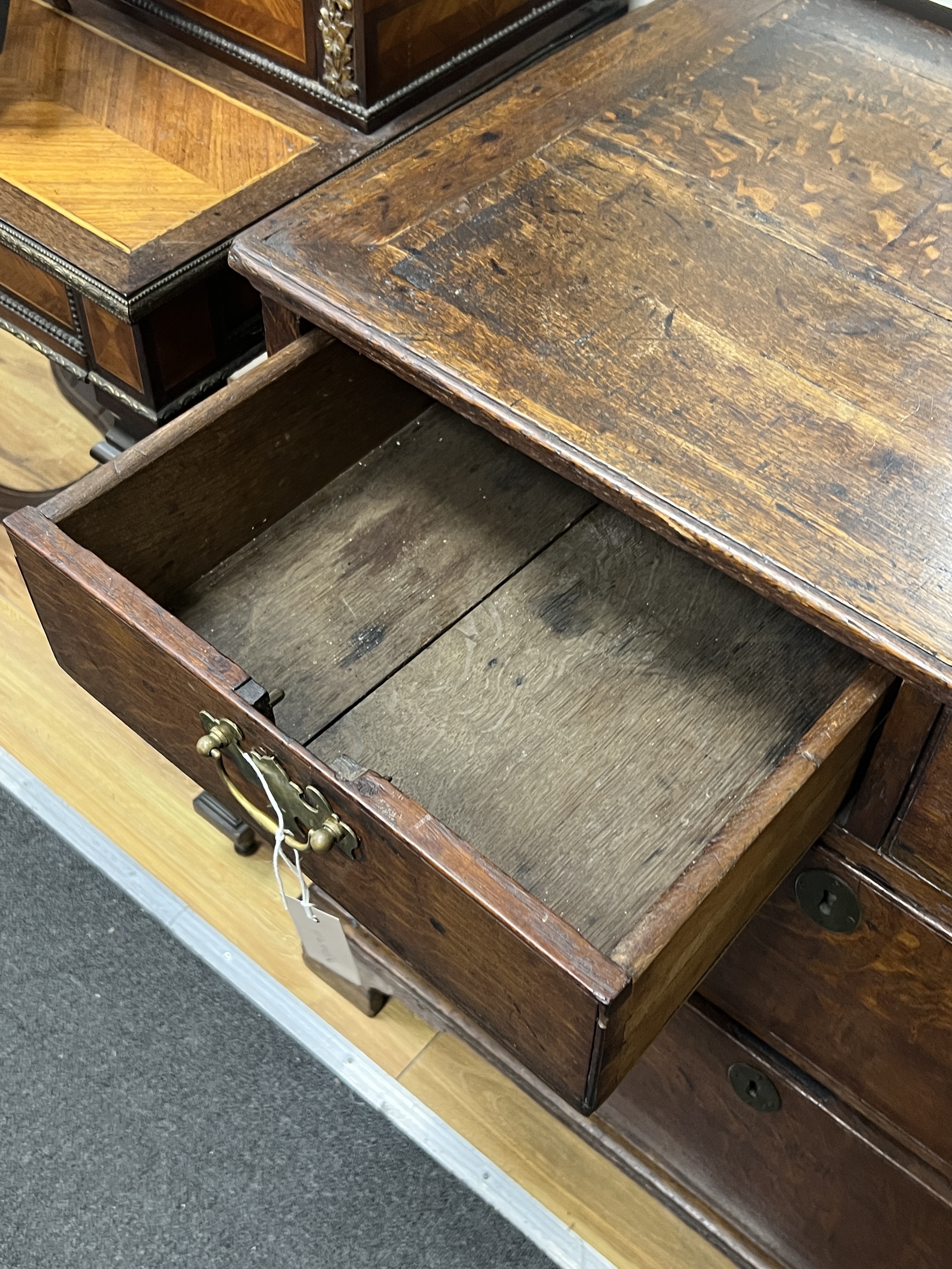 A George III provincial oak four drawer chest, width 90cm, depth 52cm, height 84cm